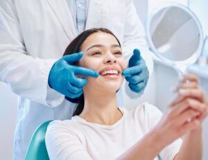 Smiling woman with the Dentist in Scottsdale, AZ