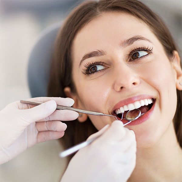 Woman getting dental check-up in Scottsdale AZ