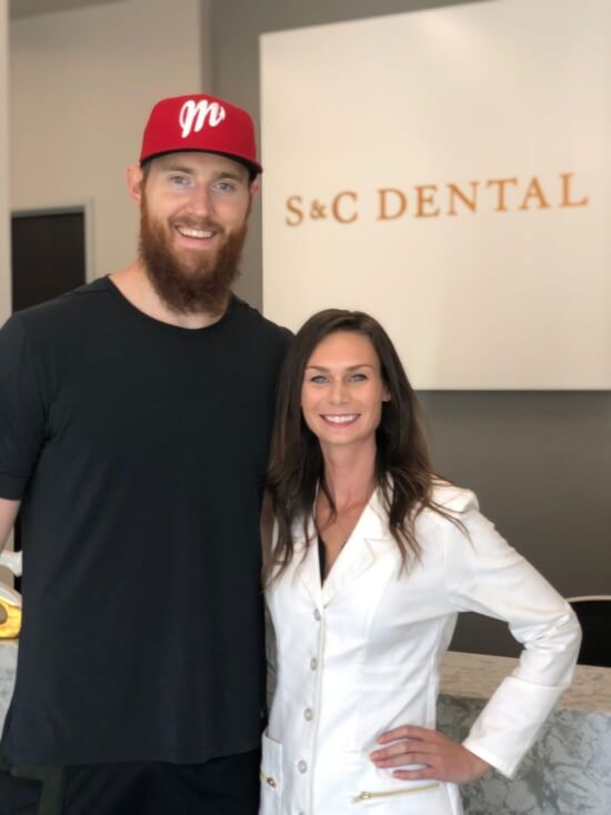 NBA player Baynes and Dr. Bri Stoterau smiling together at our Scottsdale, AZ dental clinic