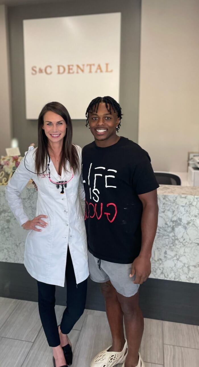 Dentist Dr. Bri Stoterau and a patient smiling at S&C Dental clinic in Scottsdale, AZ