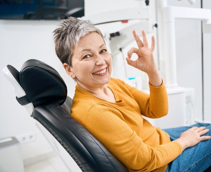 Happy Older Female After Denture Services