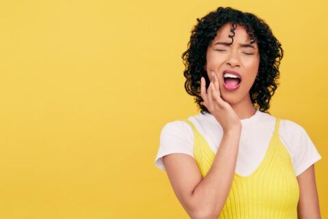 A person experiencing tooth pain